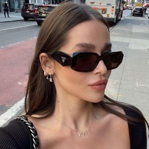 Prada Women’s Symbole SPR17W Sunglasses, Black